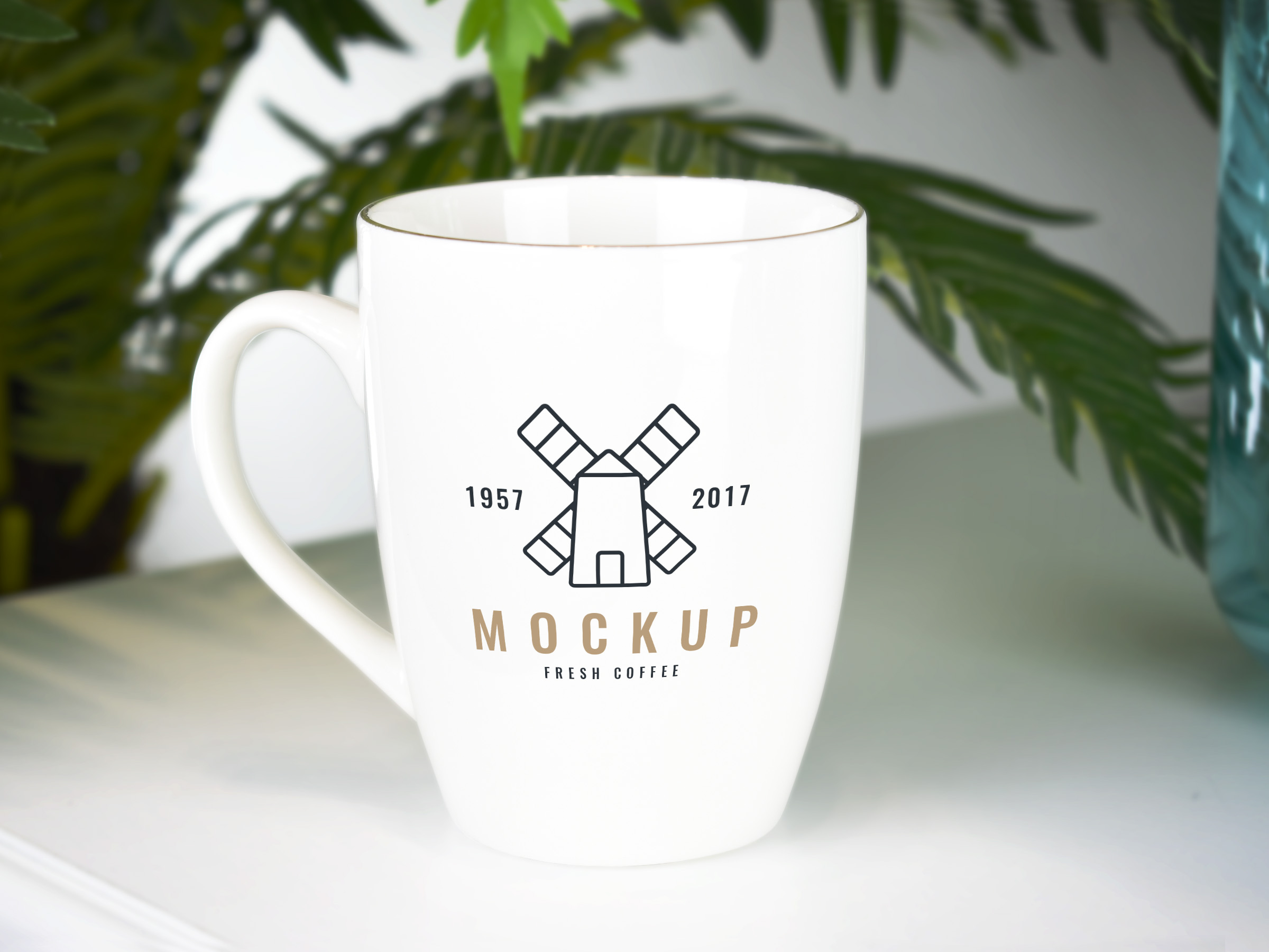 Download Mug PSD Mockup on Table - Free Download