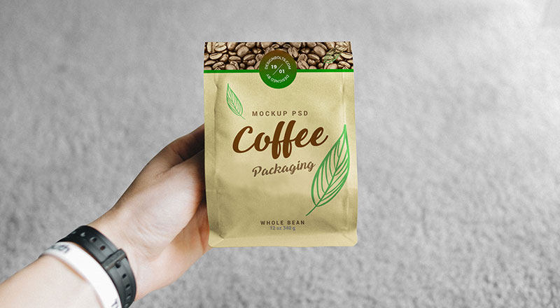 Download Hand Holding Coffee Bag Packaging Mockup - Free Download