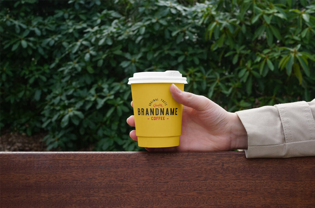 Download Hand Holding Coffee Cup PSD Mockup - Free Download